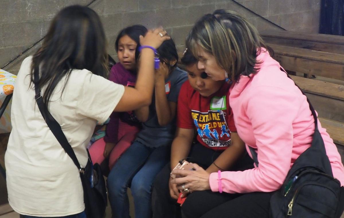 Children praying on a missions trip